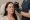 a clinician administers a forehead injection to a relaxed patient receiving a neuromodulator treatment.