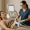 a coolsculpting device is applied to a patient’s midsection by a technician in a clinical setting.